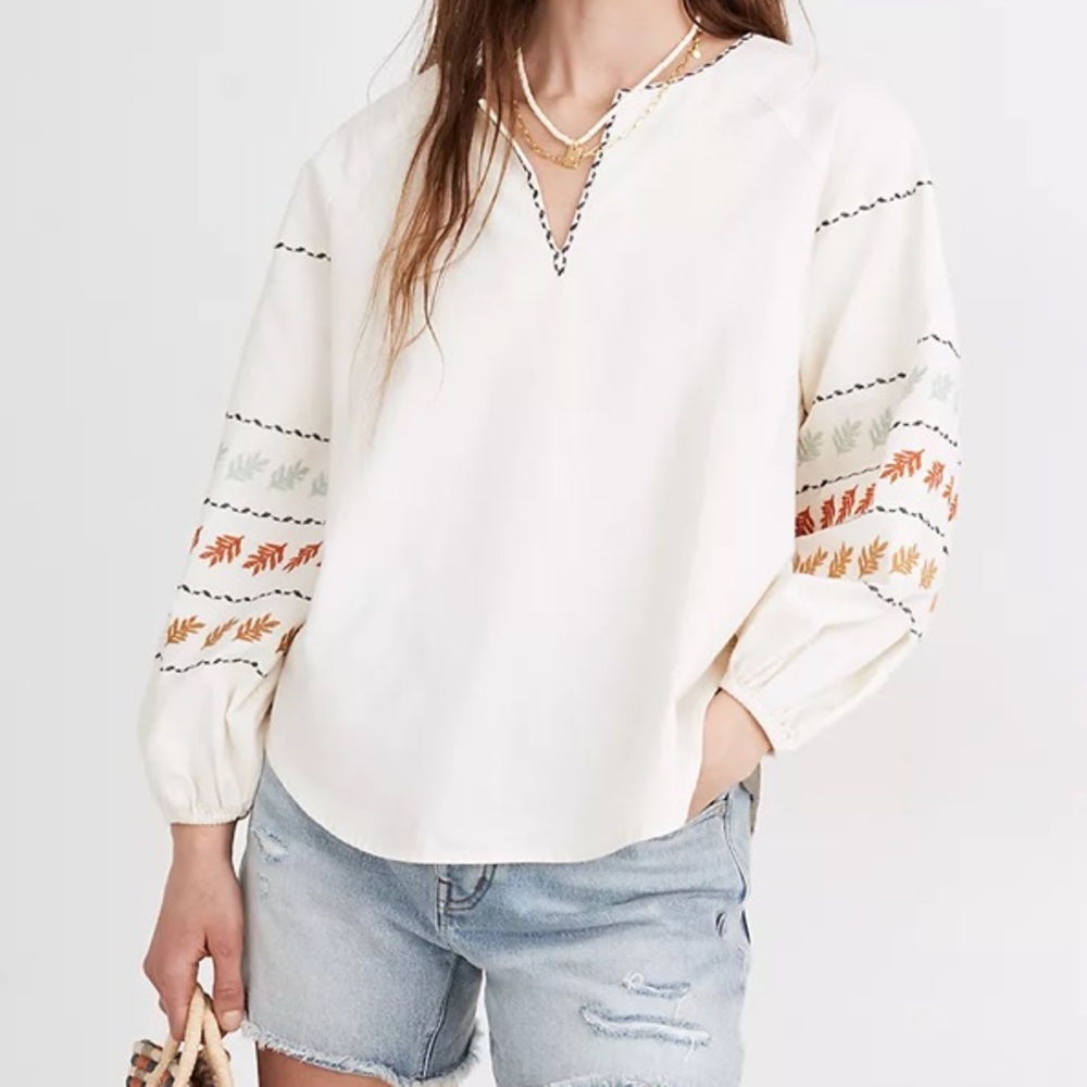 Embroidered sleeve pop-over top
